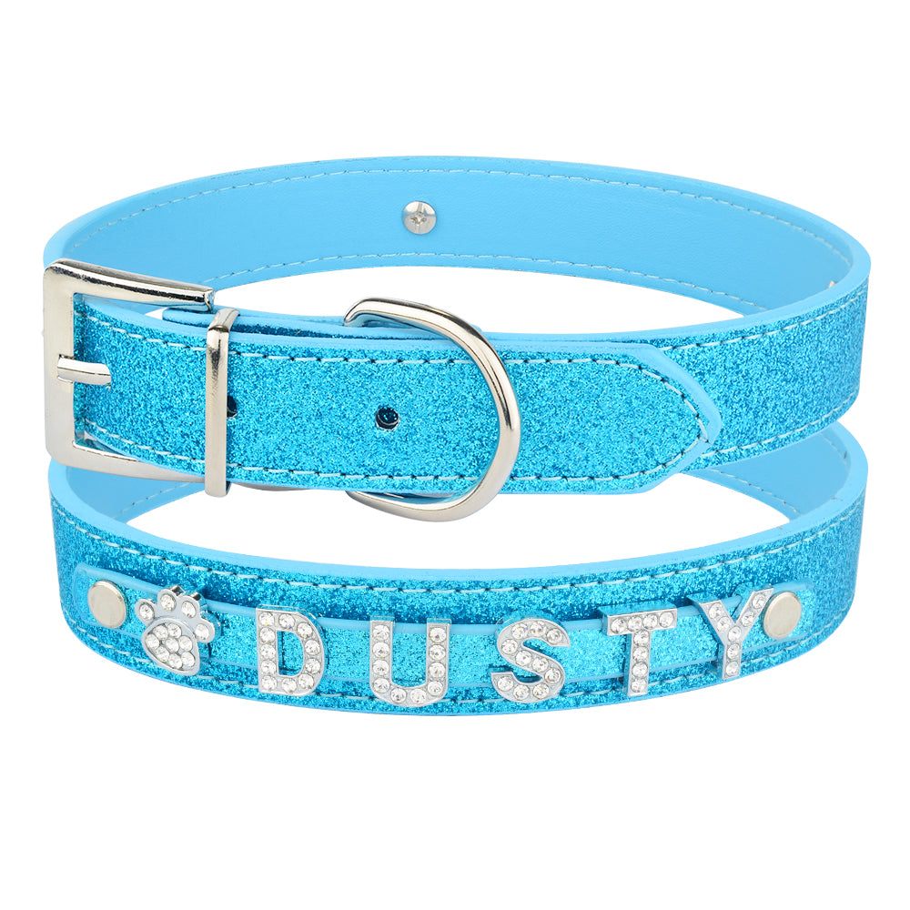 DIY alphabet dog collars in sparkling blue with personalized name 'DUSTY' and shiny embellishments.
