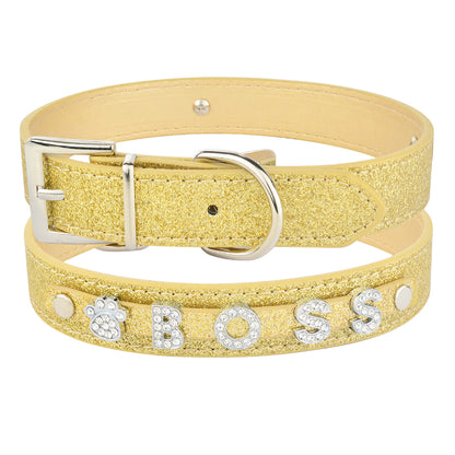 DIY alphabet dog collars in gold glitter with rhinestone embellishments spelling 'BOSS' for pets.